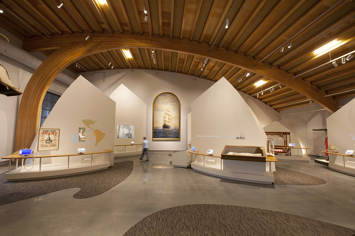 The abstract sail forms visually interpret and unify the theme for the “Sea Change” exhibit at Mystic Seaport Museum.
